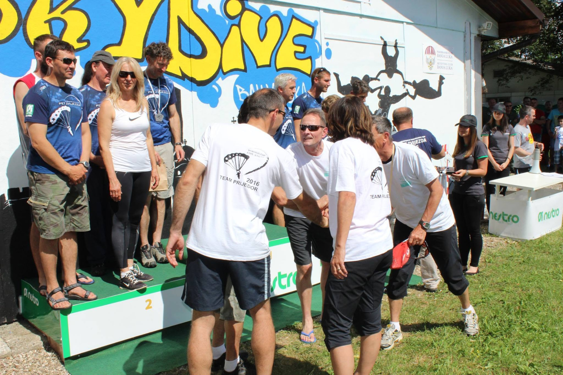 Award ceremony run by club volunteers at a community sporting event